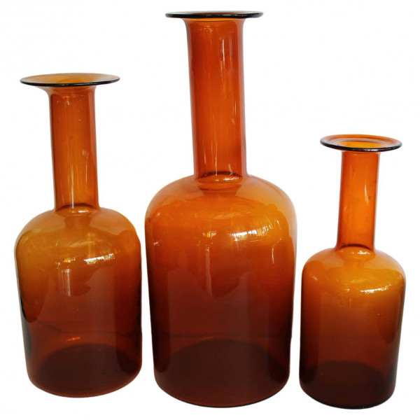 Three_Amber_Bottles_by_Otto_Bauer_for_Holmegaard,_Denmark slide0